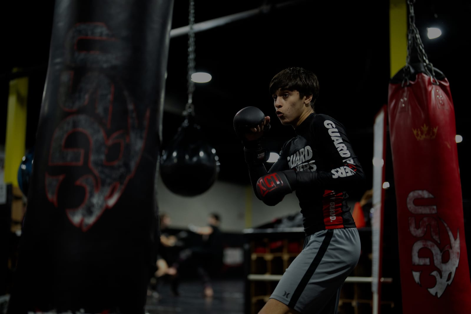 Bag work on the training floor at Xtreme Couture Toronto